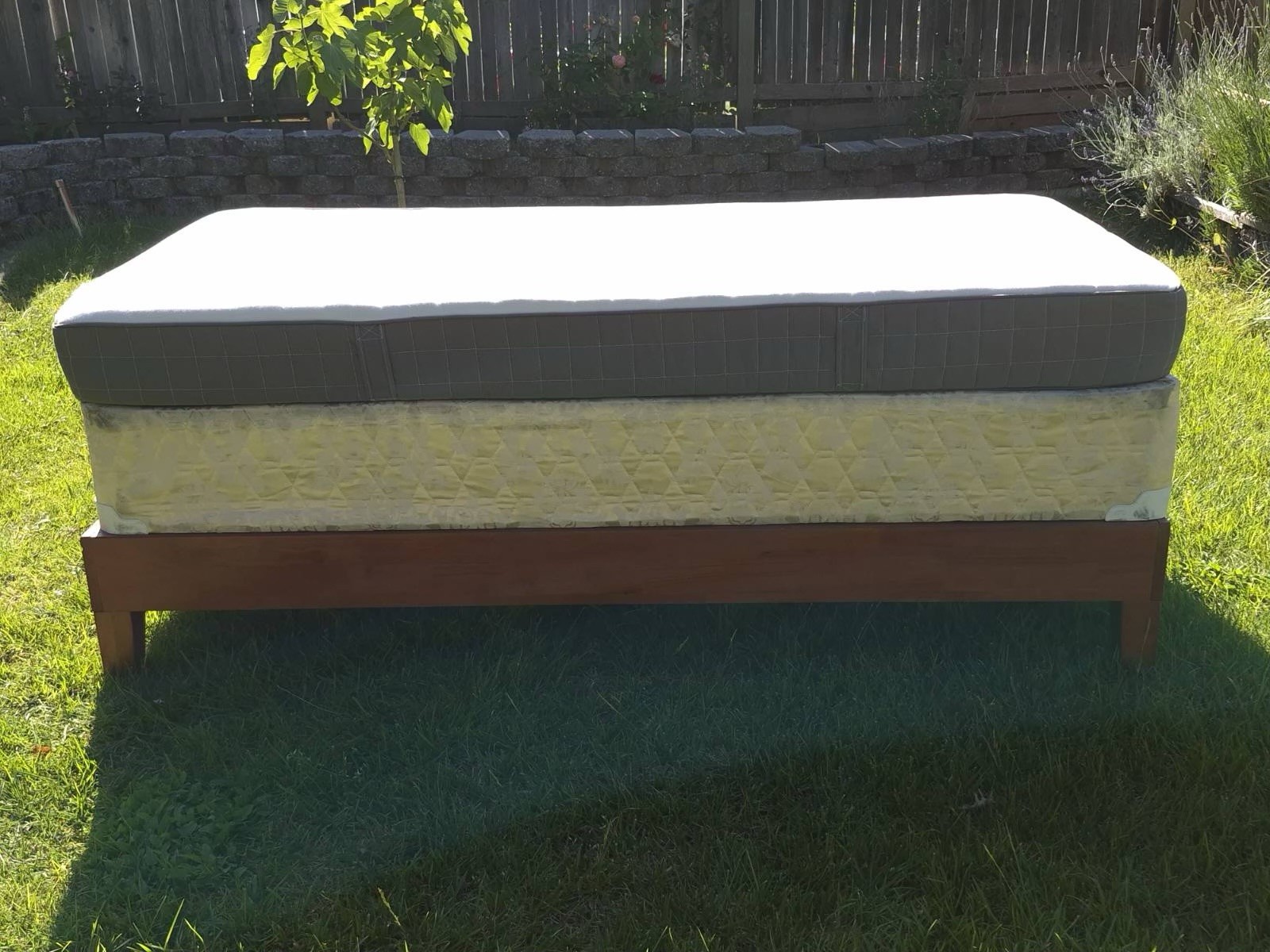 Twin Firm Quilted Mattress White Gray Beige Fabric Cover with a Wooden Bed frame