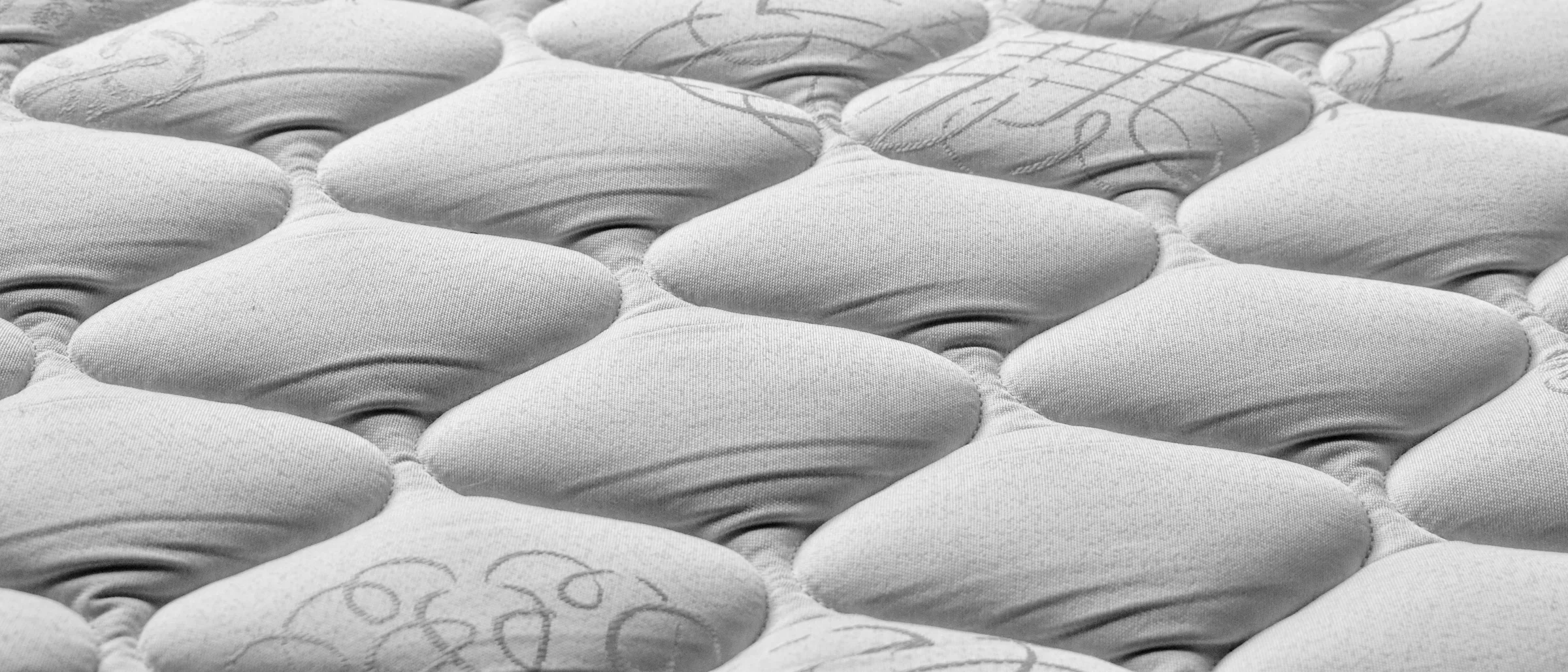 Close-up of the quilted top of a mattress